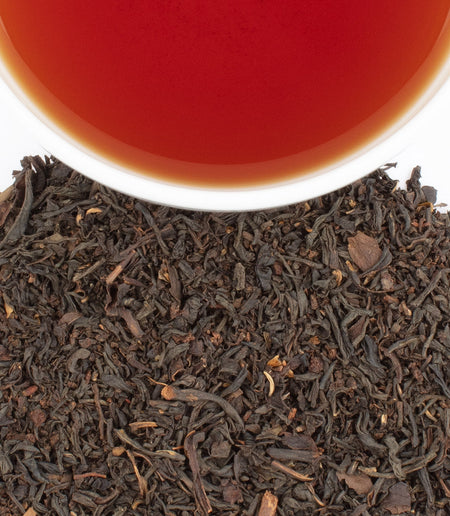 Harney & Sons Citrus Blend tea displayed in a cup, featuring notes of bergamot, grapefruit, and orange.