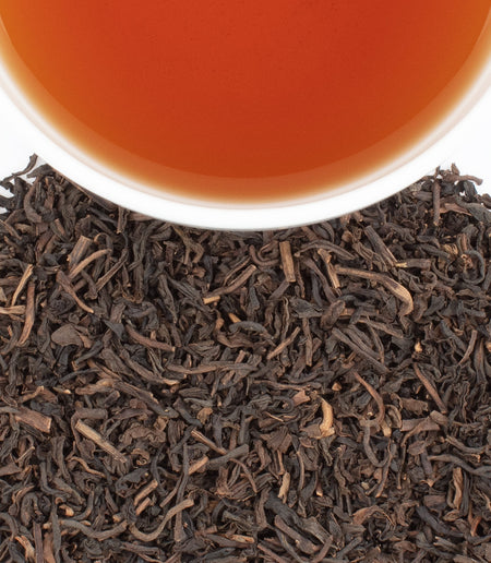 Harney & Sons Decaf Chocolate Tea in a cup, showcasing its rich chocolate color and inviting aroma, perfect for relaxation.