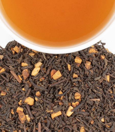 Harney & Sons Decaf Hot Cinnamon tea displayed in a cup, showcasing its rich color and aroma from cinnamon, orange peel, and cloves.