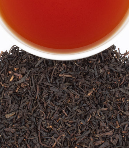 Harney & Sons Salted Caramel black tea in a cup, showcasing caramel notes and Himalayan salt with a premium black tea base.