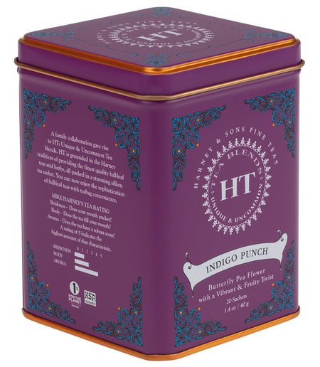 Harney & Sons Indigo Punch, HT Tin of 20 Sachets, showcasing a vibrant herbal tea blend with rose hips, apple pieces, and butterfly pea flower.