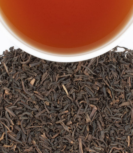 Harney & Sons Decaf Earl Grey in a cup, featuring decaffeinated Ceylon tea with bergamot oil, decaf blend.