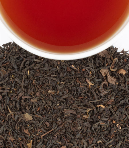 Harney & Sons Earl Grey tea in a cup, showcasing a blend of high-quality teas infused with natural bergamot oil.