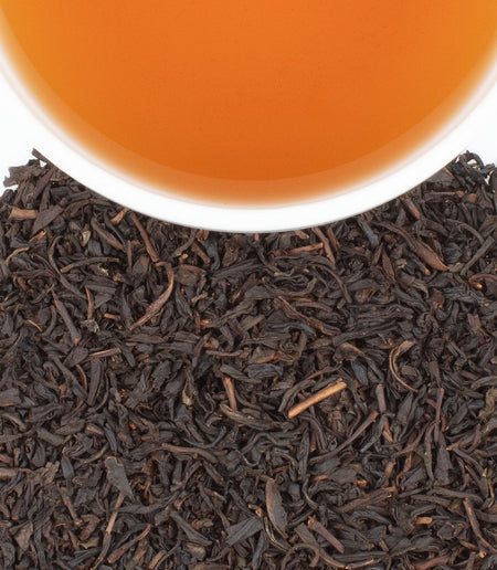 Harney & Sons Fruits d'Alsace dessert tea in a cup, showcasing a blend of apricot, cherry, and plum flavors.