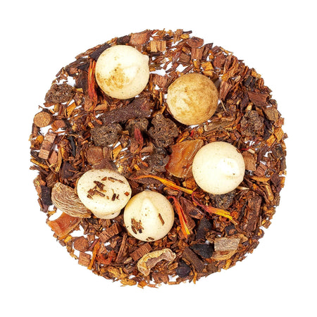 Beach House Coastal Carrot Cake tea in loose-leaf form, showcasing rooibos, carrots, and chocolate bits.