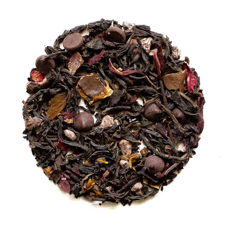 Beach House Cherry Falls Chocolate tea leaves in a background, showcasing rich black tea with cherry and dark chocolate notes.