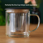 August Glass Mug - Clear Elegance, a transparent glass mug showcasing a sleek and modern design, ideal for beverages.