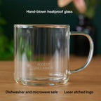 August Glass Mug - Clear Elegance showcasing a transparent glass mug with a sleek design and sturdy handle.