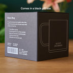 August Glass Mug - Clear Elegance, a transparent glass mug showcasing a sleek and simple design, ideal for beverages.