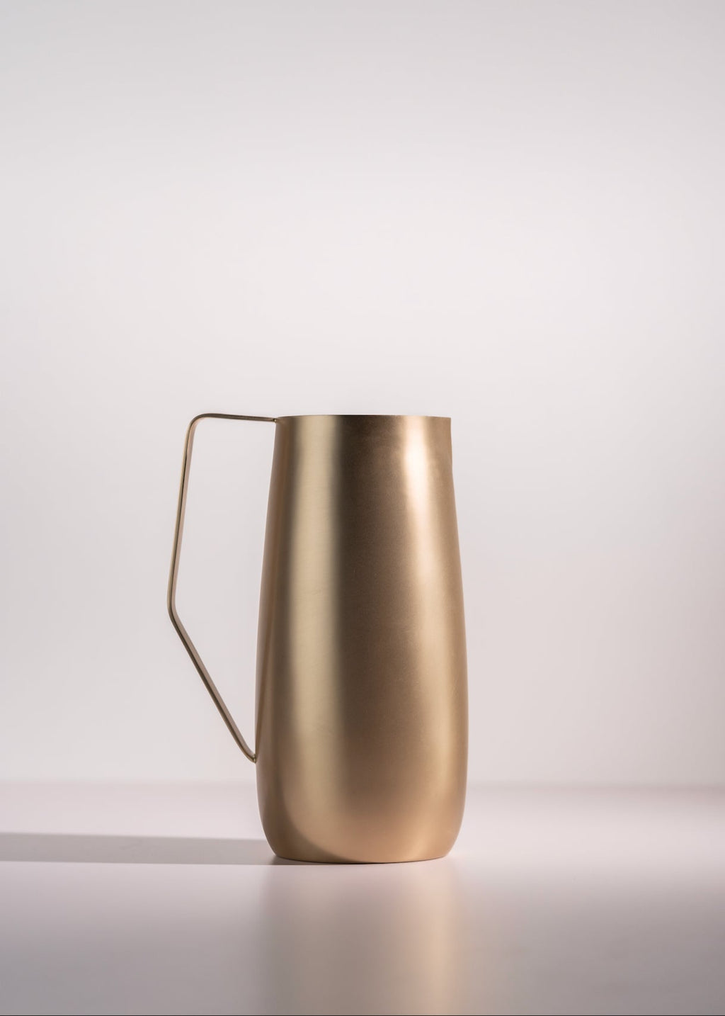 Powered by People Artisan Brass Pitcher