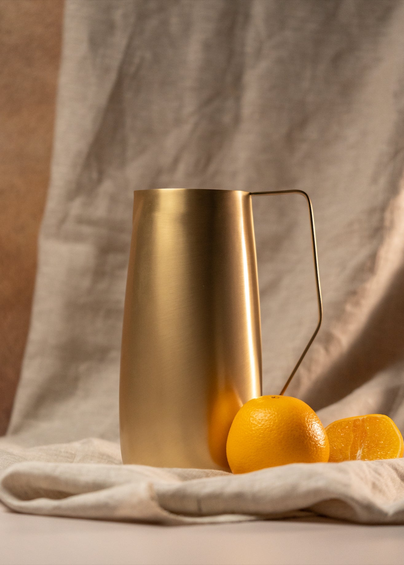 Powered by People Artisan Brass Pitcher