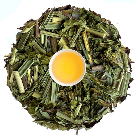 Danfe Spearmint Lemongrass Herbal Tea (Caffeine Free) loose-leaf blend shown in a tea cup with fresh spearmint and lemongrass.
