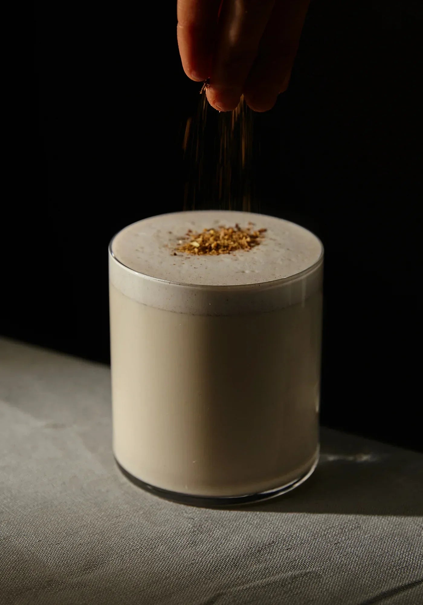 9 Spice Honey Fresh Chai by Somage USA in a clear container, showcasing a blend of spices and honey for brewing tea.