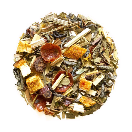 Beach House Sea Glass Green Iced Blend shown with green tea leaves, featuring ingredients like lemongrass and orange peel.