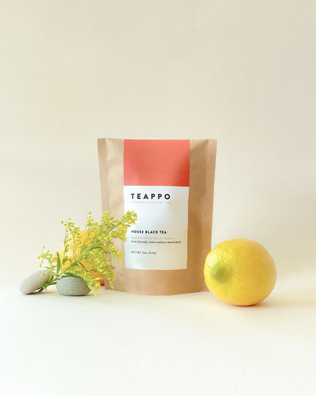 Teappo House Black Tea, 2 oz. package, featuring premium black tea leaves from Taiwan, shown in a sealed bag.