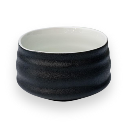 Aprika Life Black and White Ceramic Matcha Bowl, a 4.5-inch diameter handcrafted bowl for matcha tea preparation and presentation.