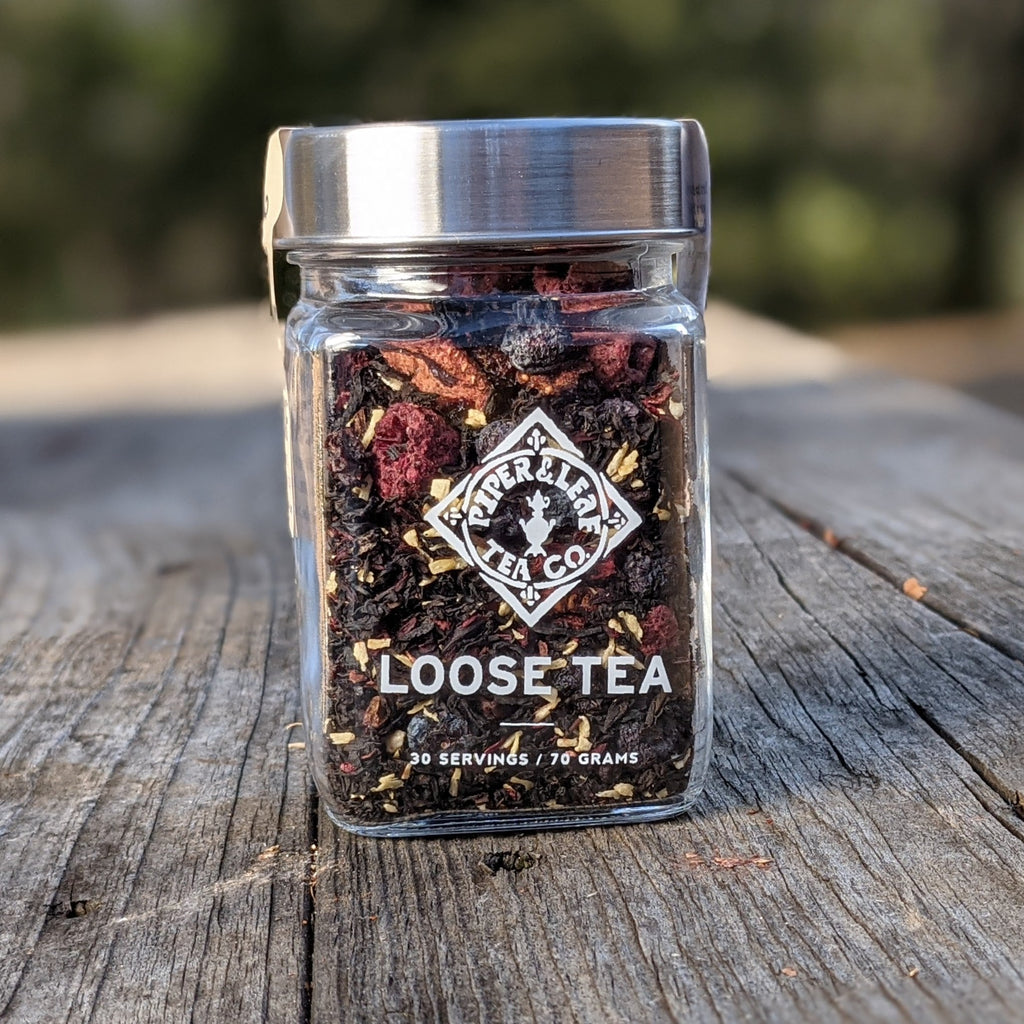 Piper and Leaf Cherry Christmas Glass Jar of Loose Leaf Tea - 30 Servings in a clear glass jar with a label.