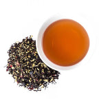 Piper and Leaf Cherry Christmas Glass Jar of Loose Leaf Tea with lid, showcasing tea leaves, 30 servings, by Piper and Leaf.