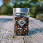 Piper and Leaf Chocola-Tea Glass Jar of Loose Leaf Tea - 30 Servings, featuring a glass jar filled with dark tea blend ingredients.