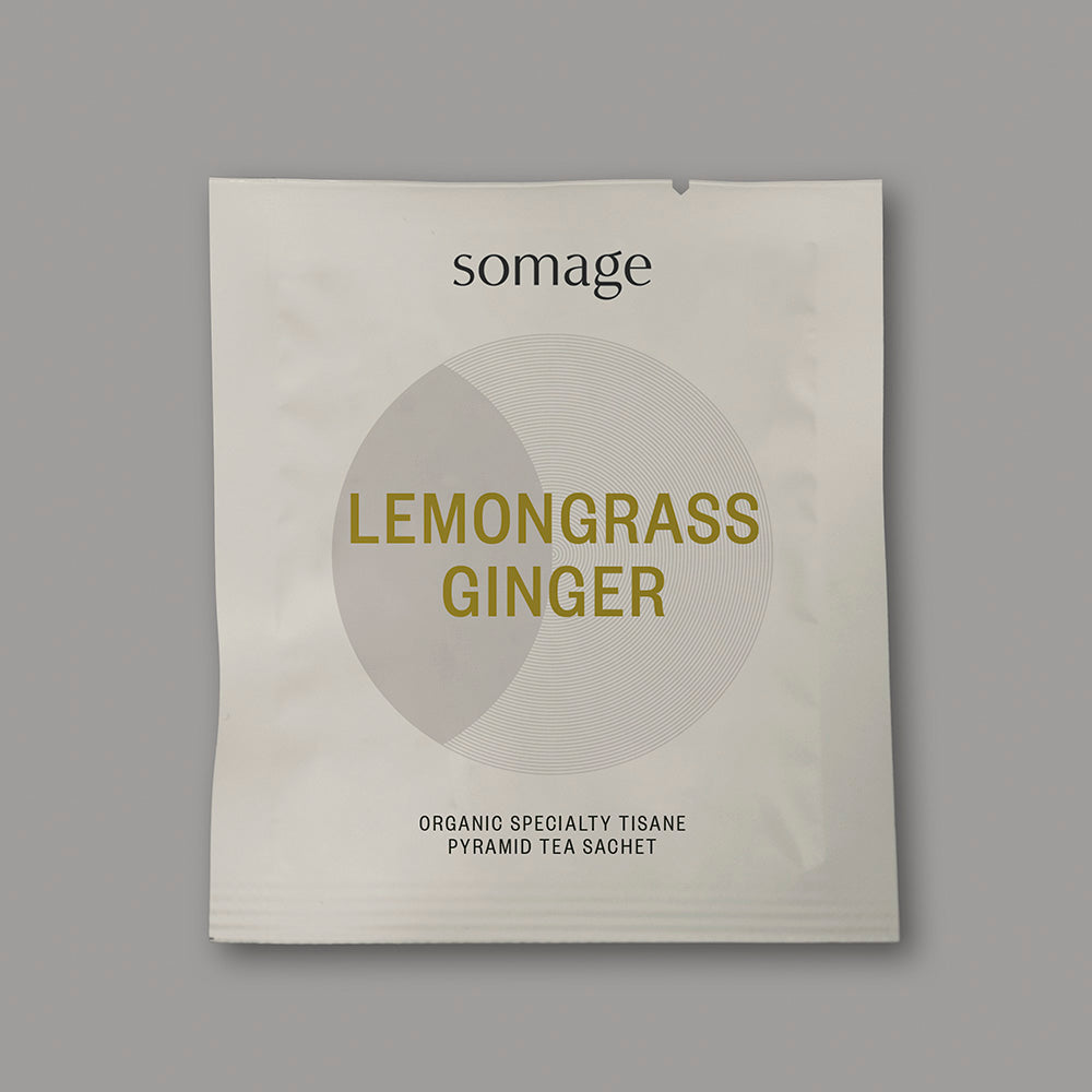 Lemongrass & Ginger Pyramid Sachet by Somage USA, showing individually wrapped tea sachets with vibrant packaging.
