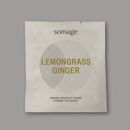 Lemongrass & Ginger Pyramid Sachet by Somage USA, showing individually wrapped tea sachets with vibrant packaging.