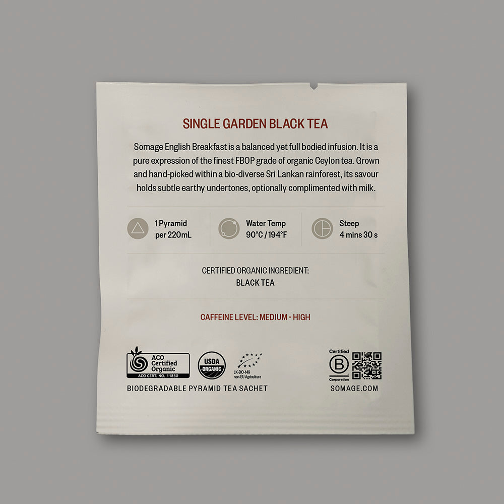 English Breakfast Pyramid Sachet (individually wrapped) by Somage USA, showcasing a pyramid tea bag with branding.