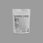 Chamomile Flowers Pyramid Bags by Somage USA displayed in a pyramid-shaped tea bag format, showcasing dried chamomile flowers.