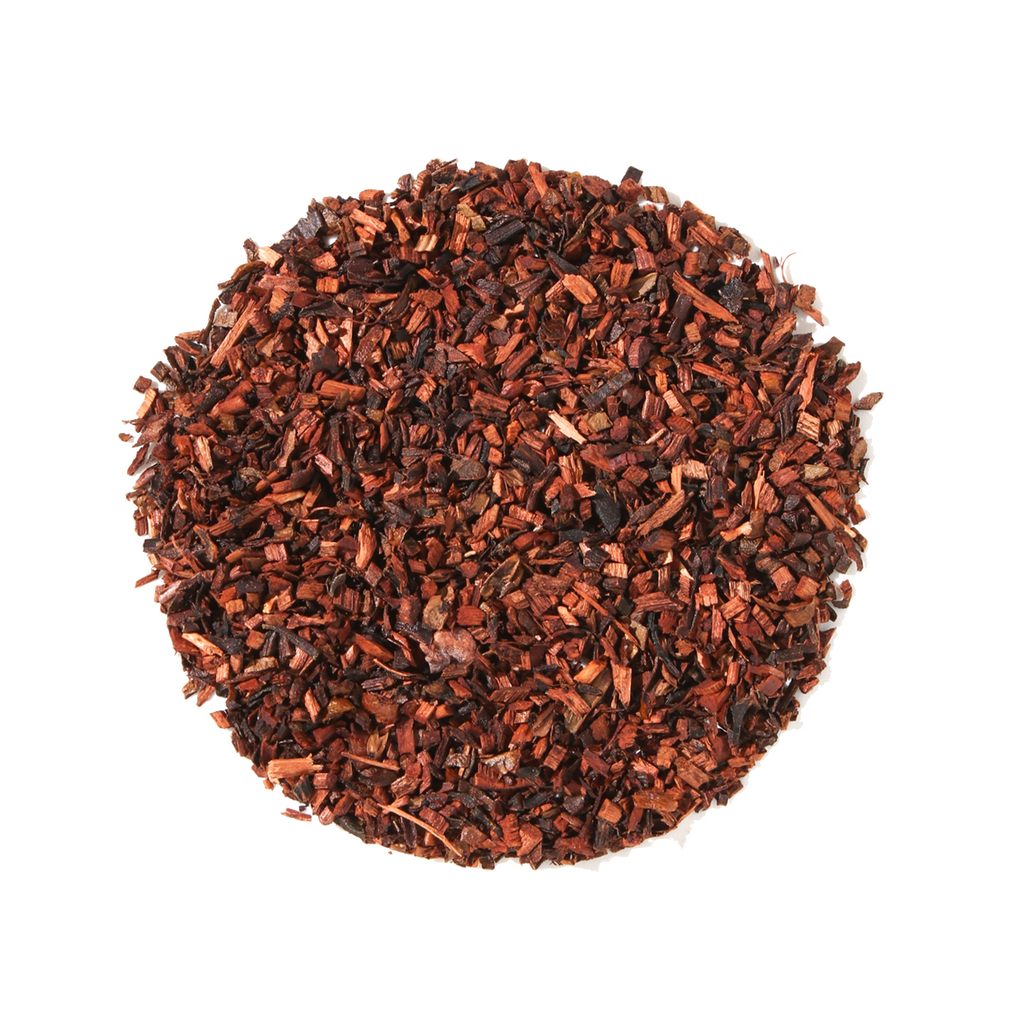 Plum Deluxe Chocolate Hazelnut Dessert Tea in a circular tea blend display, featuring honeybush, cocoa nibs, and natural flavors.