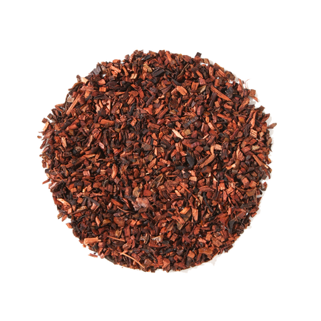 Plum Deluxe Chocolate Hazelnut Dessert Tea in a circular tea blend display, featuring honeybush, cocoa nibs, and natural flavors.