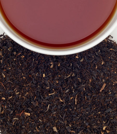 Harney & Sons Orange Pekoe (Ceylon & India) tea displayed in a cup, showcasing small, broken BOP tea leaves.