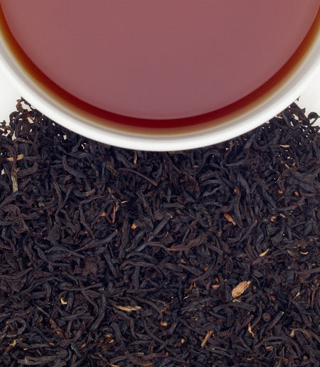 Cup of Harney & Sons Elyse's Blend tea, showcasing its rich color and aroma, highlighting its unique flavor profile.