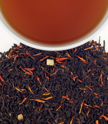 Harney & Sons Holiday Tea in a cup, showcasing its rich black tea with citrus, almond, clove, and cinnamon notes.