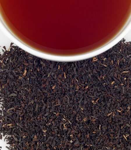 Harney & Sons Irish Breakfast tea in a cup, crafted from 100% Assam leaves for a bold flavor, ideal for solo enjoyment.