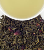Harney & Sons Jane's Garden Tea, Tin of 20 Sachets displayed in a cup, showcasing the product's packaging and tea.