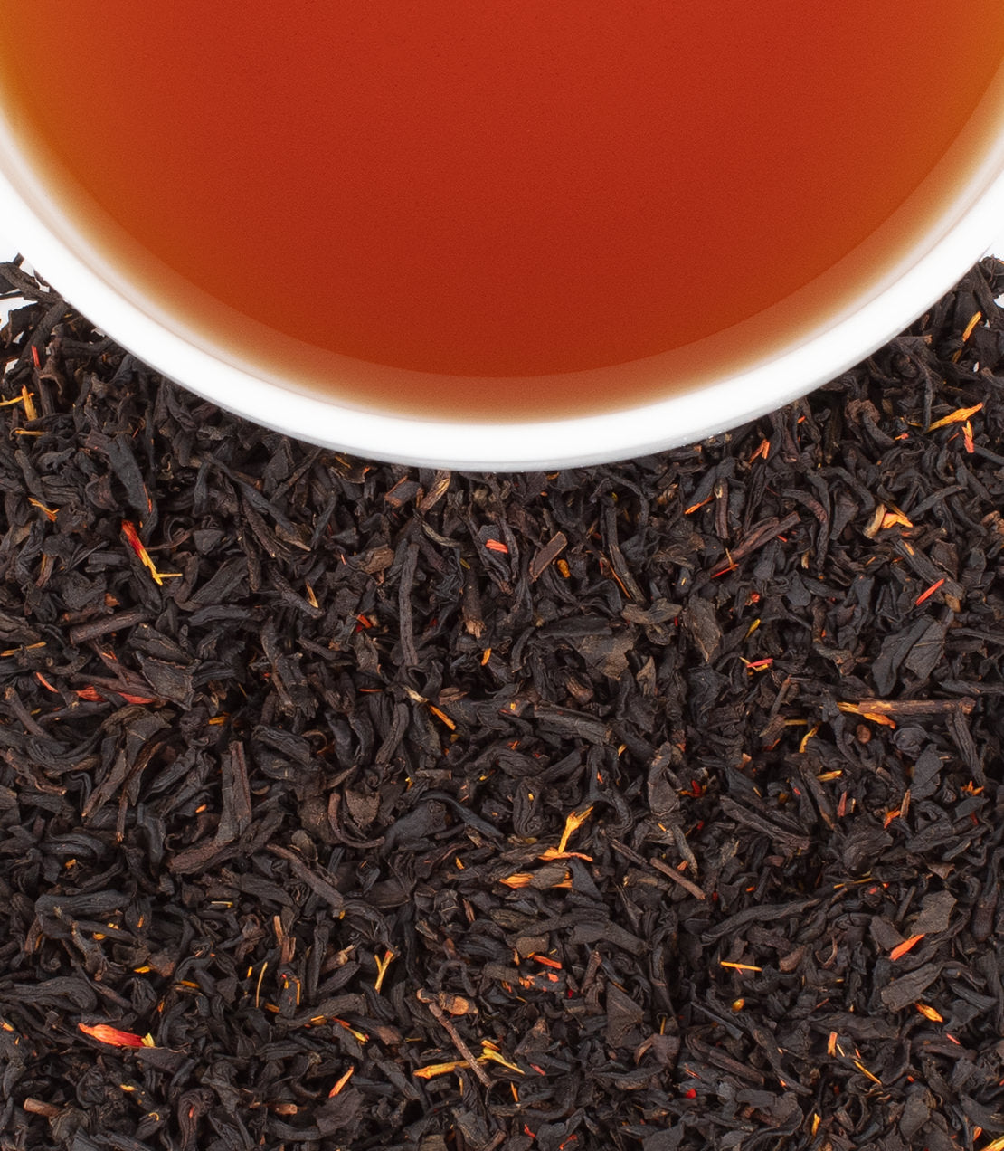 Cup of Harney & Sons New England Breakfast tea, featuring a robust black tea with maple essence, served hot.