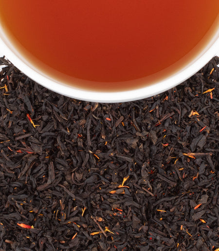 Cup of Harney & Sons New England Breakfast tea, featuring a robust black tea with maple essence, served hot.