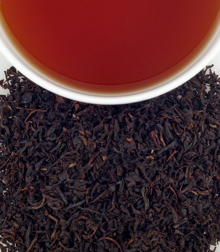 Harney & Sons Organic Earl Grey tea displayed in a cup, featuring Assam and Korakundah teas infused with bergamot oil.