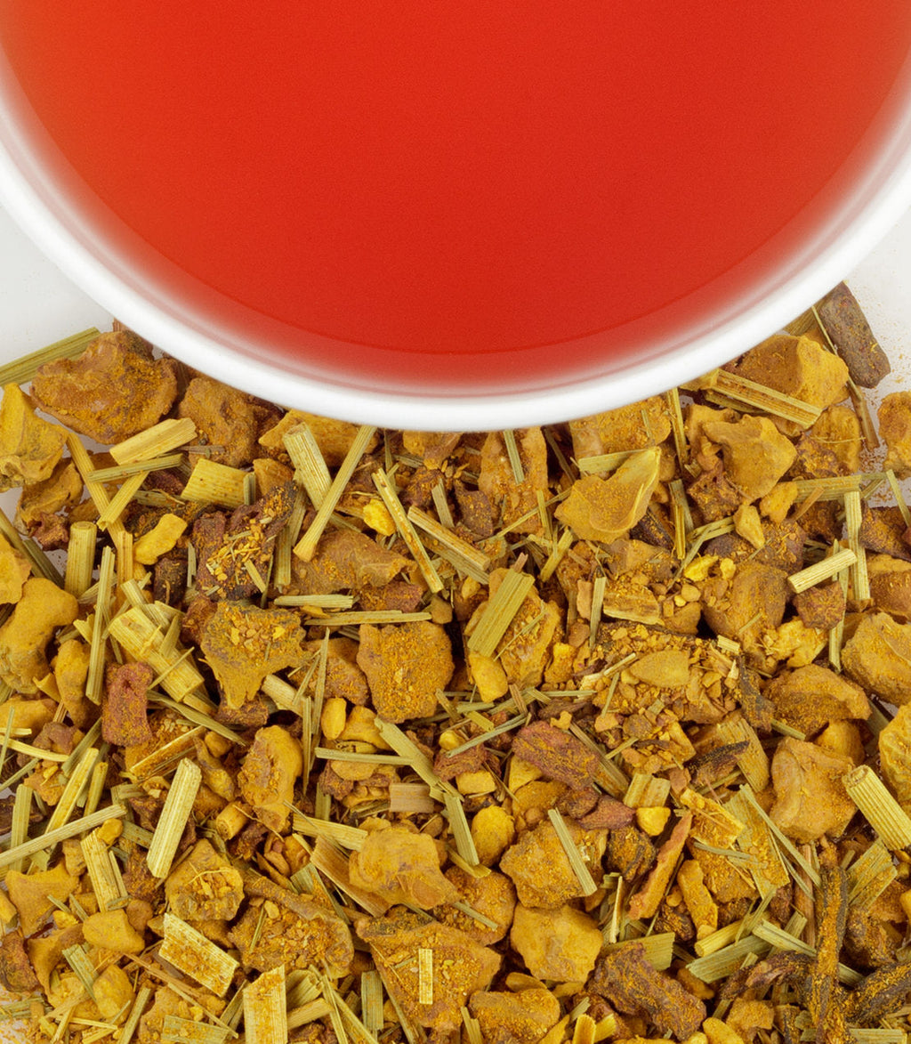 Harney & Sons Organic Ginger Turmeric, HT Tin of 20 Sachets displayed in a cup with herbal tea