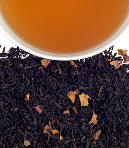 Harney & Sons Valentine's Day tea blend with chocolate black tea and pink rosebuds, displayed in a cup.