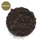Plum Deluxe House Blend Black Tea (Creamy Vanilla English Breakfast) packaging featuring a circle graphic design.