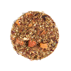 Plum Deluxe Dragonfruit Desire Herbal Tea in a circle graphic, featuring green rooibos, dragonfruit, mango, and hibiscus.
