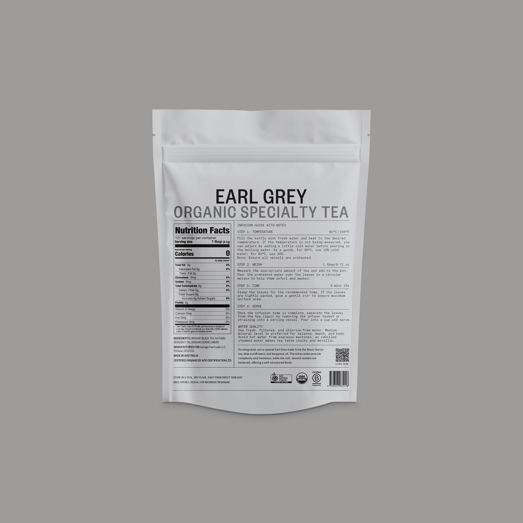 Earl Grey Loose Leaf tea by Somage USA, displayed in a clear container with loose tea leaves visible.