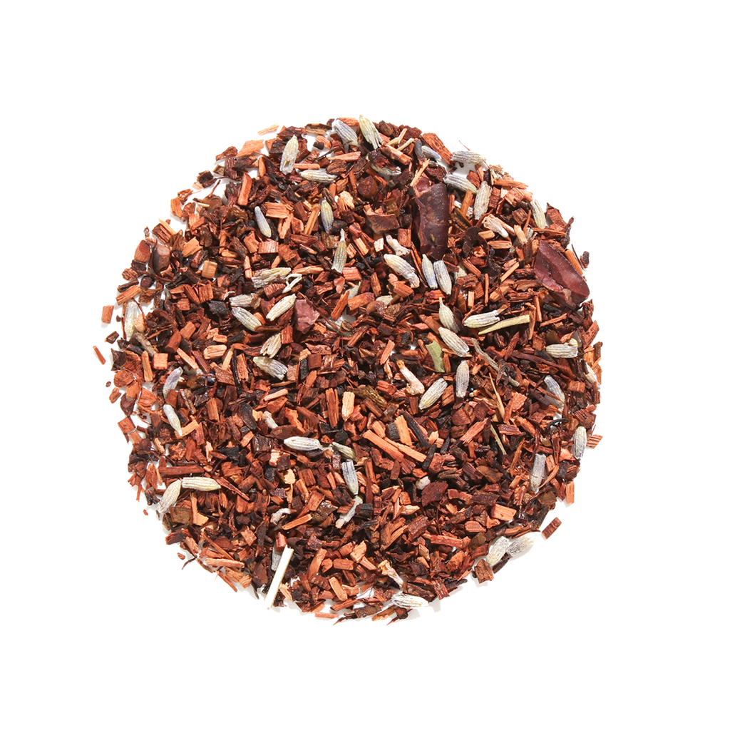 Plum Deluxe Easy Like Sunday Morning Herbal Tea (Chocolate - Lavender) in a circular package, showcasing tea blend and ingredients.