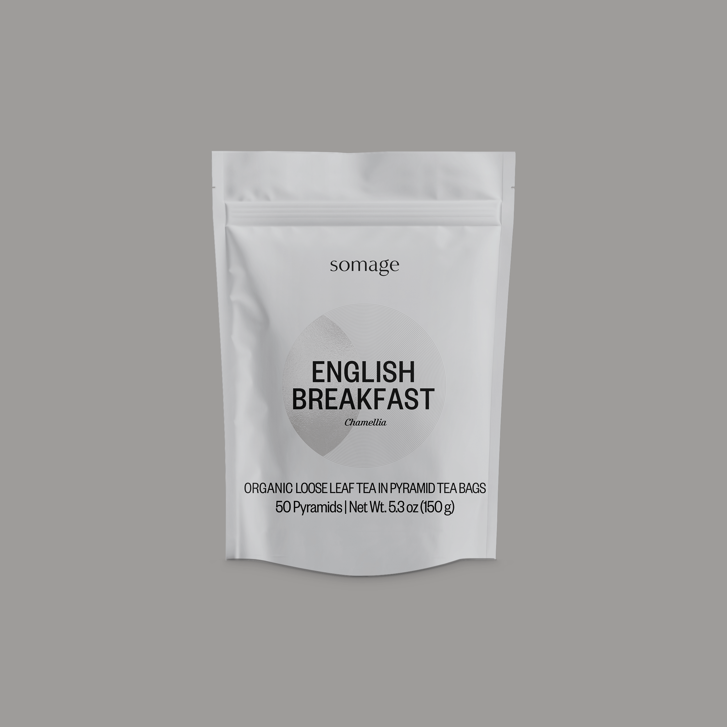 English Breakfast Pyramid Bags by Somage USA, showcasing a pack of pyramid tea bags filled with Ceylon tea.