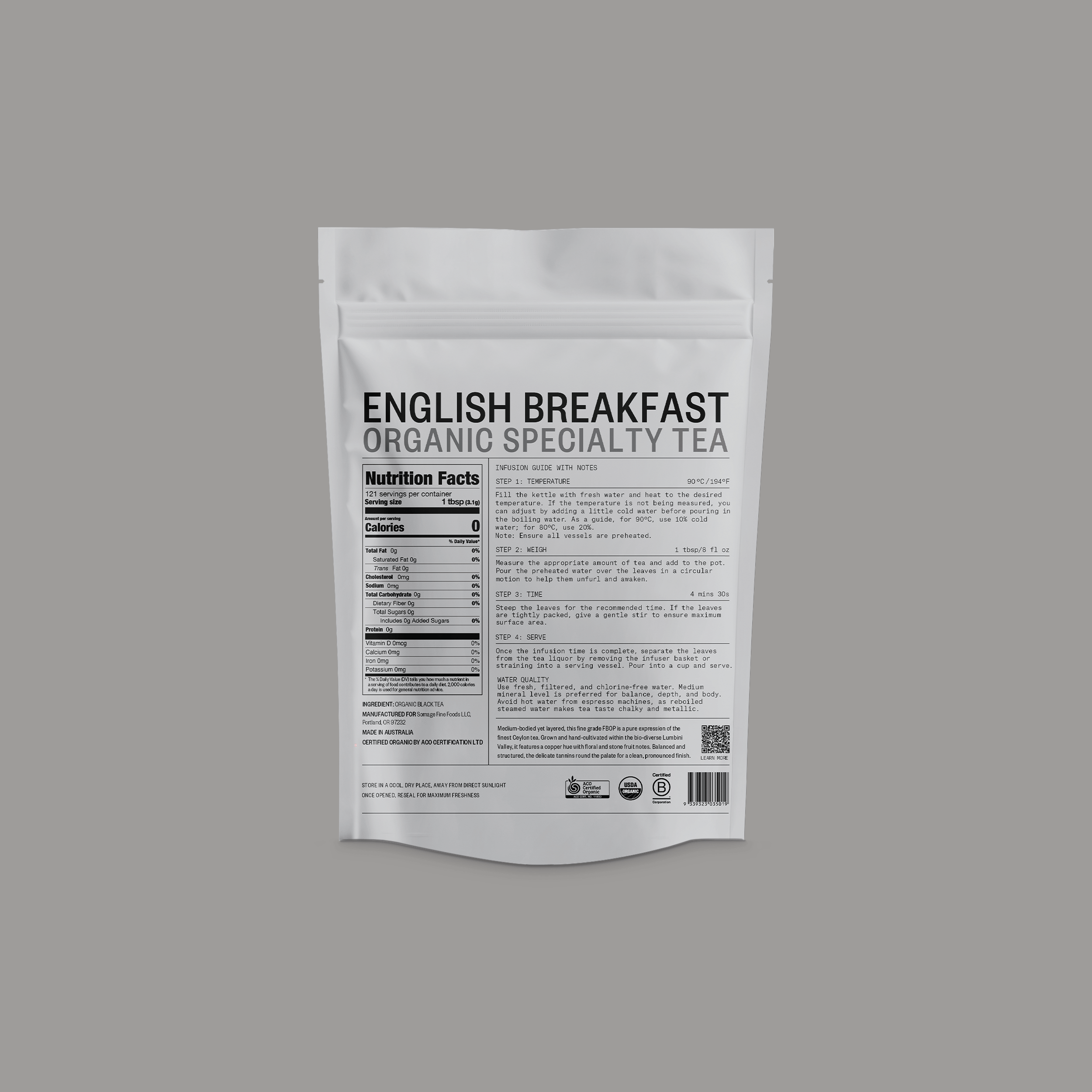 English Breakfast Loose Leaf by Somage USA, showing dry tea leaves in a loose form on a wooden surface.
