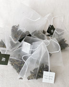 Teappo Four Springs tea blend packaging with vibrant design, showcasing the product by Teappo