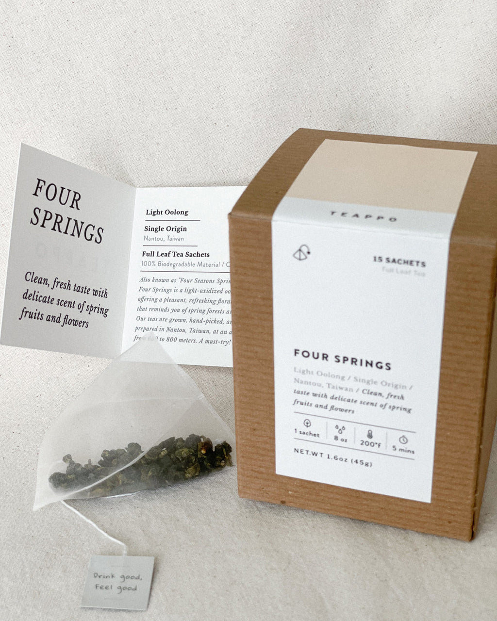 Teappo Four Springs herbal tea blend with natural ingredients in a clear package, displayed in the image.