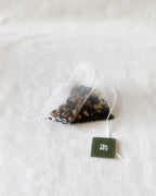 Teappo Golden Barley Black Tea package displayed in a clean setting, showcasing the product's design and branding.