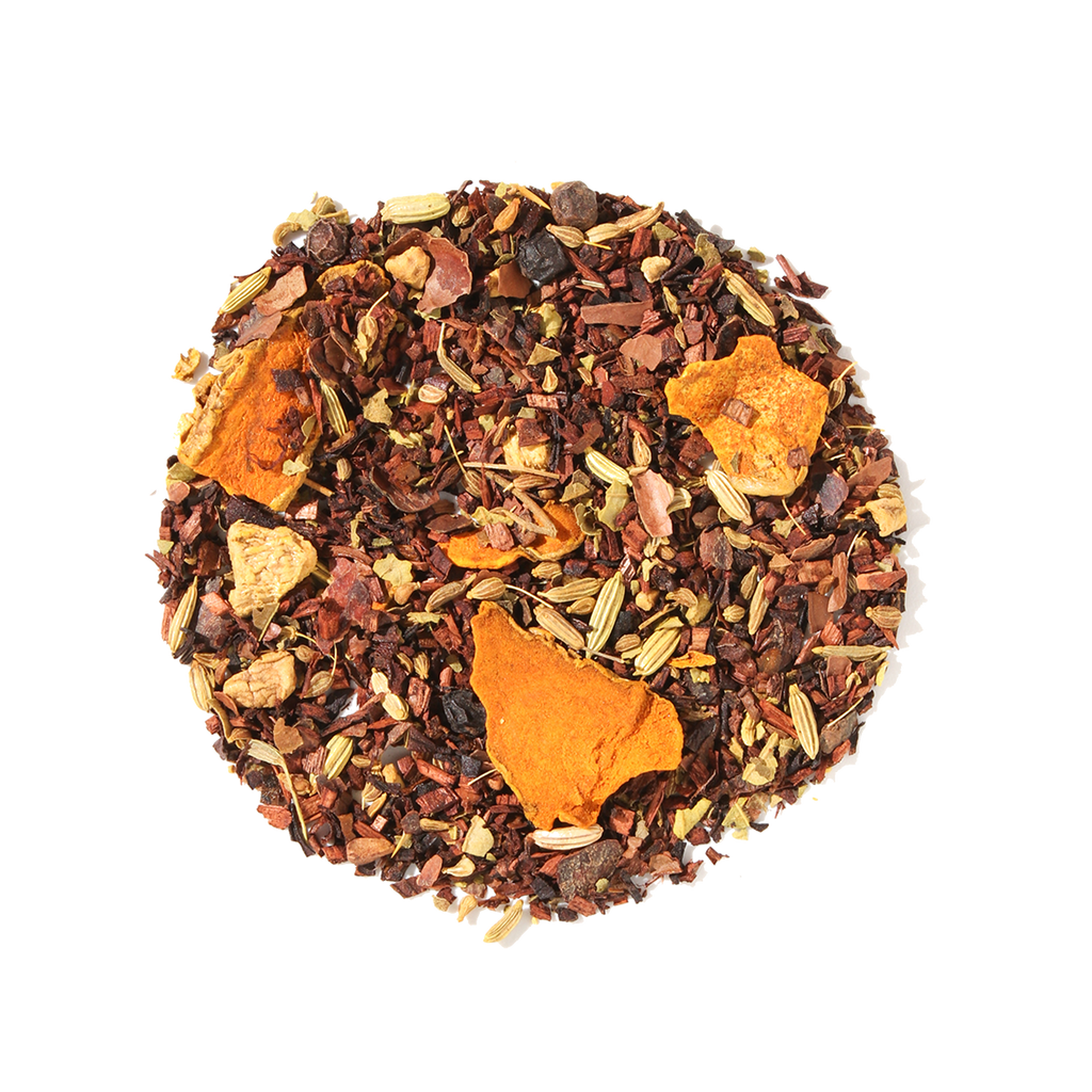 Plum Deluxe Golden Cacao Herbal Tea (Turmeric - Chocolate) in a circular package, featuring key ingredients like turmeric and cacao.
