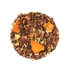 Plum Deluxe Golden Cacao Herbal Tea (Turmeric - Chocolate) in a circular package, featuring key ingredients like turmeric and cacao.